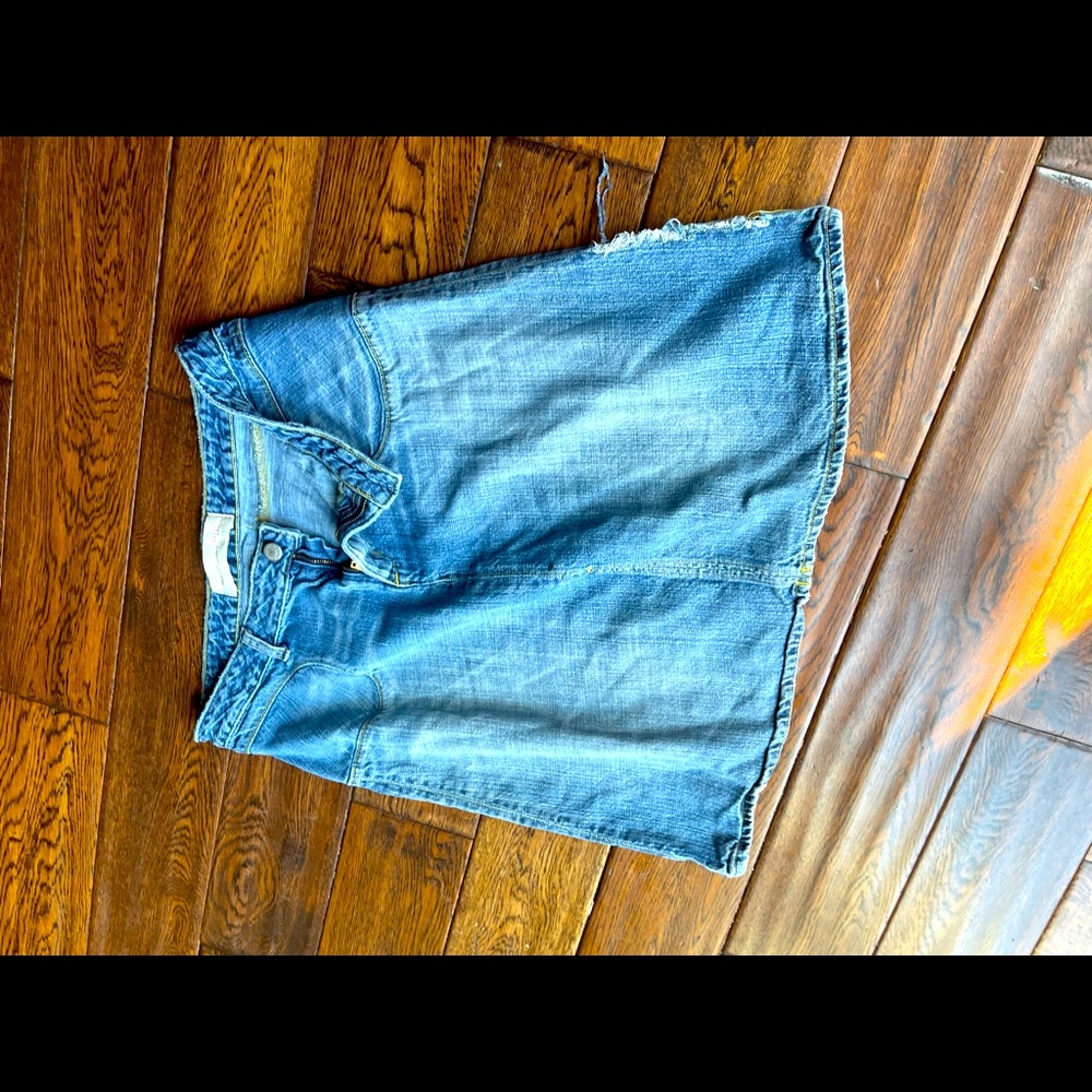 Distressed paper denim and cloth skirt